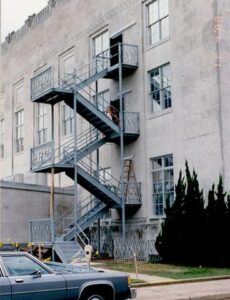 Exterior of a building with fire escape.